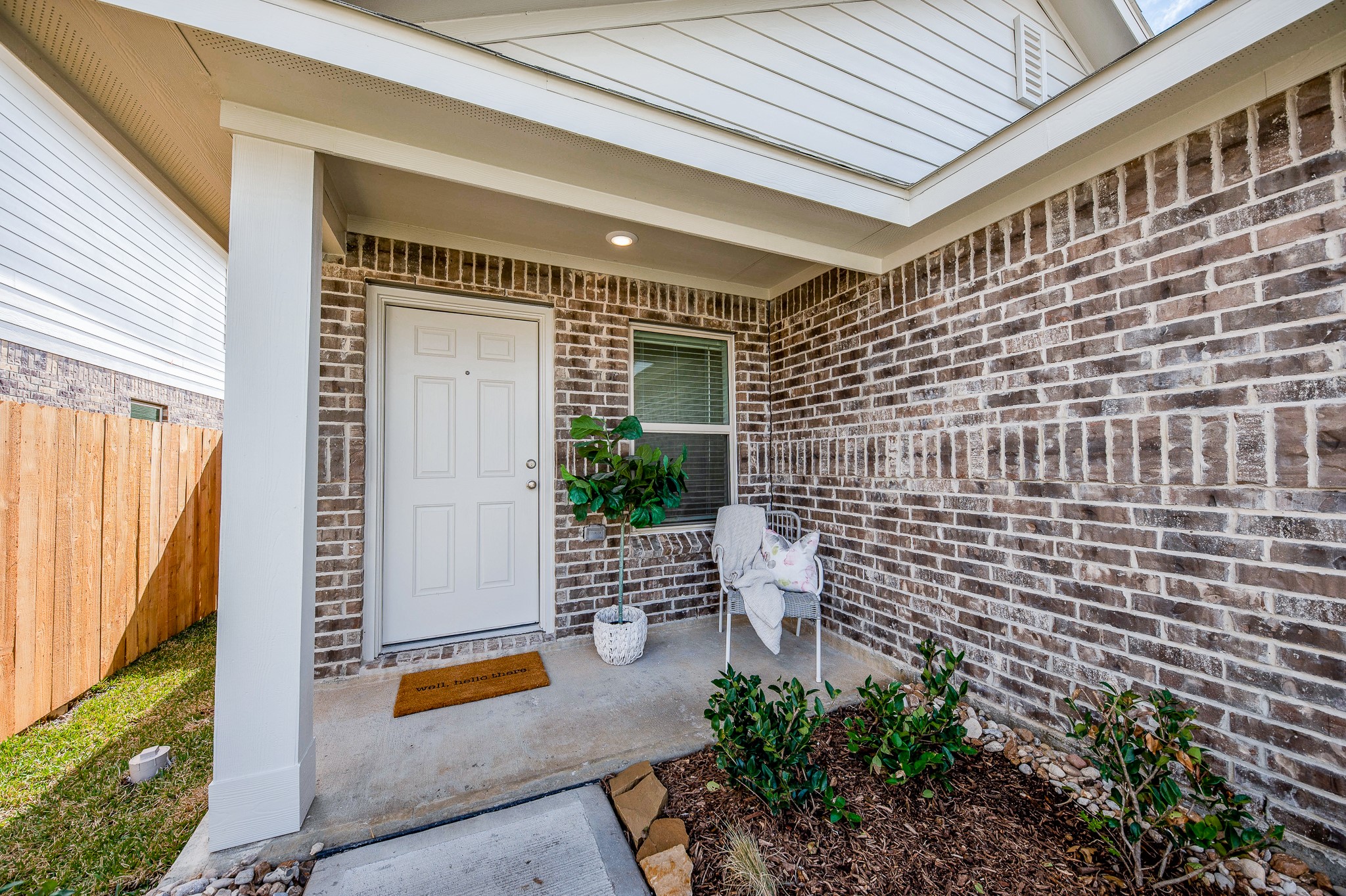 140 Austin Street Angleton, TX 77515 - Photo 3 of 27 A sweet, covered porch to enjoy your morning cup of coffee and to collect your Amazon packages!