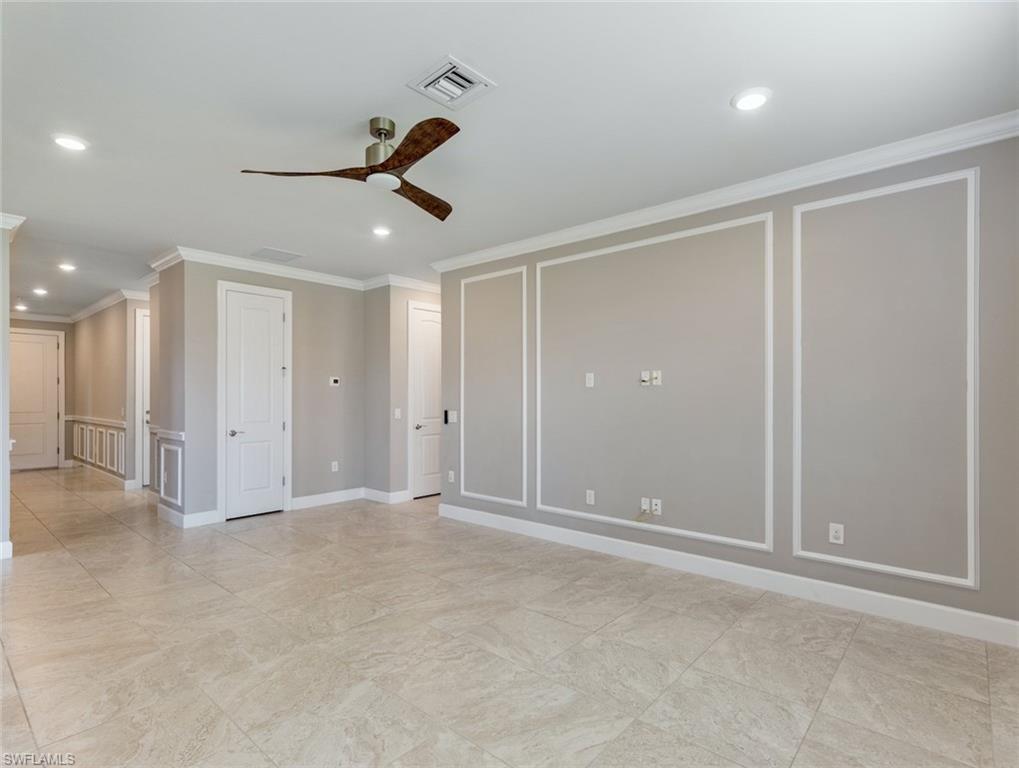 19953 Beverly Park Road Estero, FL 33928 - Photo 11 of 35 an empty room with closet and windows
