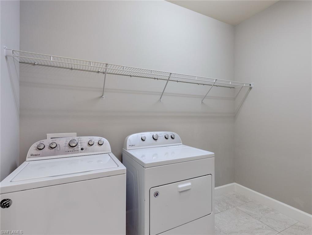 19953 Beverly Park Road Estero, FL 33928 - Photo 20 of 35 a utility room with dryer and washer