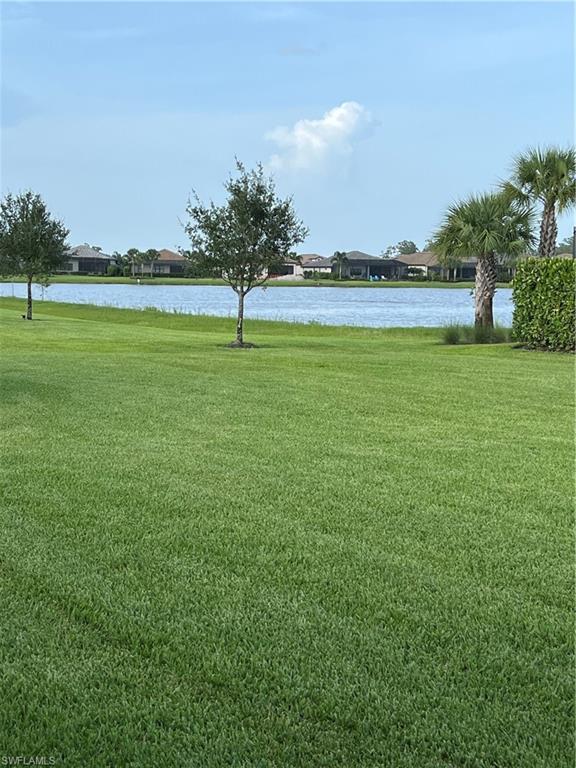 19953 Beverly Park Road Estero, FL 33928 - Photo 21 of 35 a view of a lake with a big yard