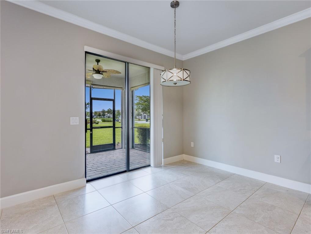 19953 Beverly Park Road Estero, FL 33928 - Photo 6 of 35 a view of an empty room with a window