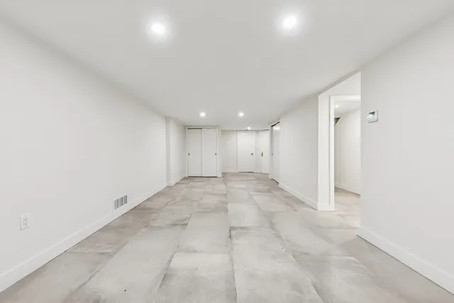 an empty room with a natural light