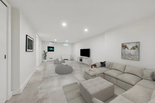 a bathroom with a toilet a sink and bathtub