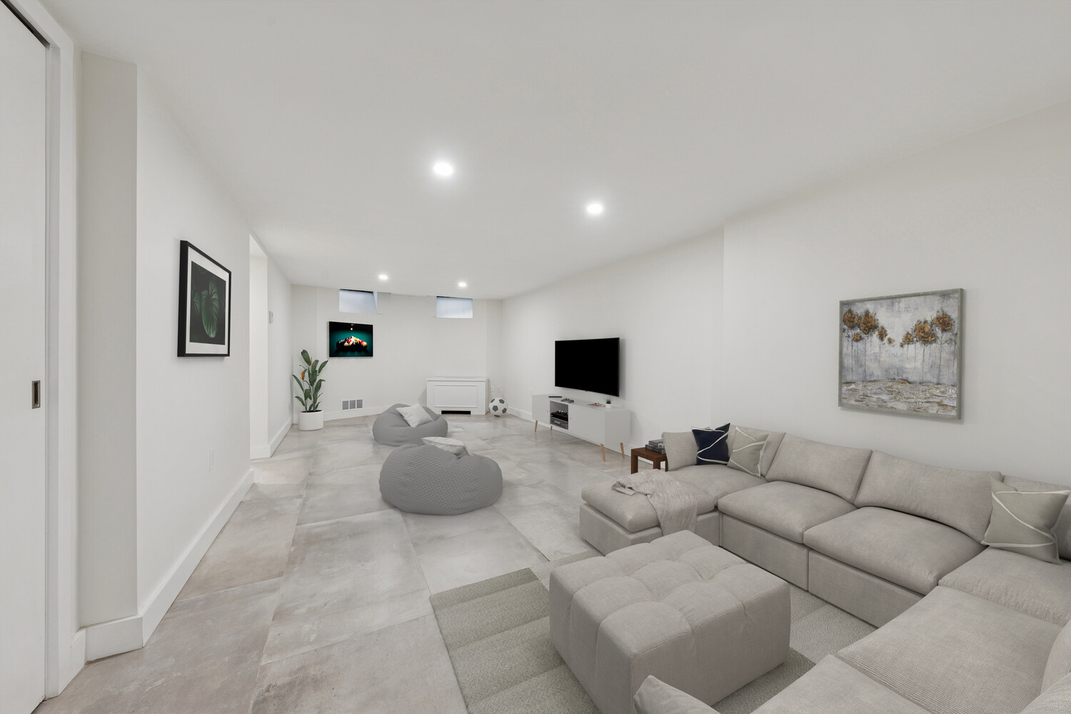 282 Convent Avenue, Unit 1 Manhattan, NY 10031 - Photo 9 of 14 a living room with furniture and a flat screen tv