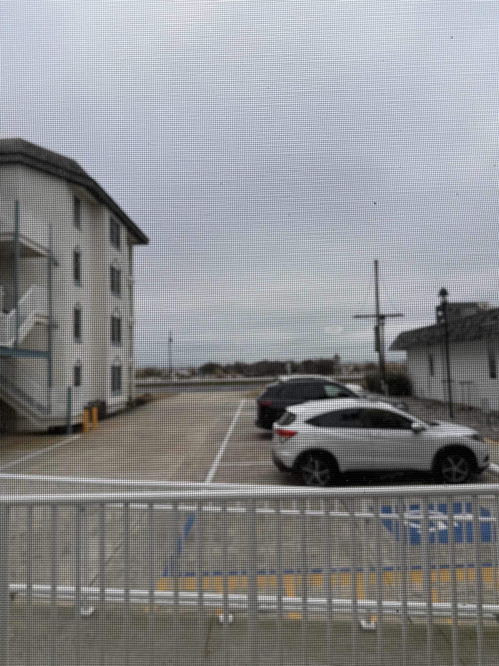 217 Beach, Unit 1 Cape May, NJ 08204 - Photo 6 of 12 a kitchen that has a sink and a stove