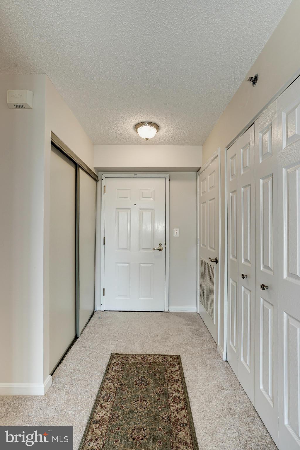 19385 Cypress Ridge Terrace, Unit 207 Leesburg, VA 20176 - Photo 2 of 21 Entry hallway