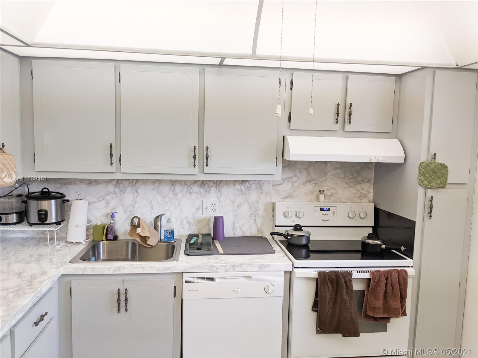8350 Sands Point Boulevard, Unit E204 Tamarac, FL 33321 - Photo 2 of 10