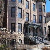 a front view of a building with street view