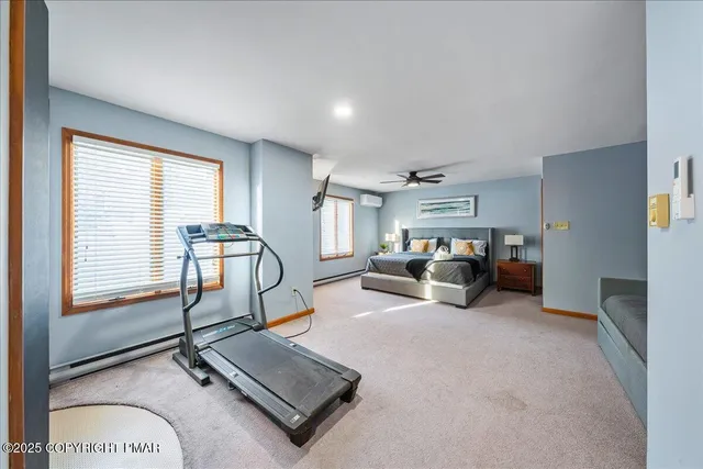 a room with gym equipment and a window