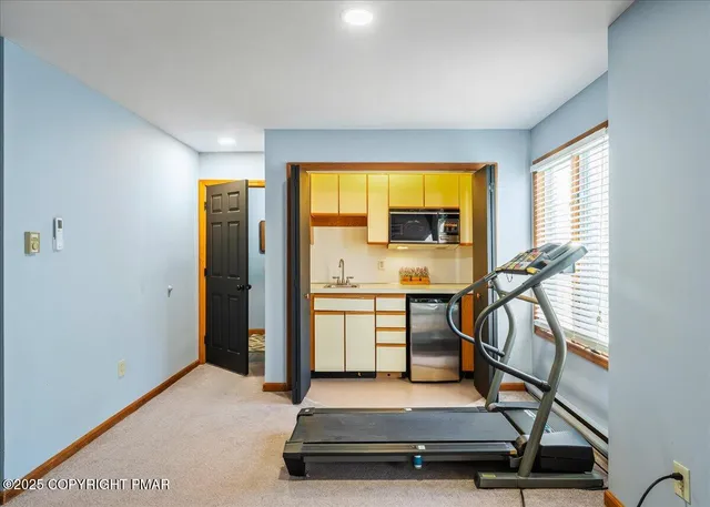 a view of a room with gym equipment