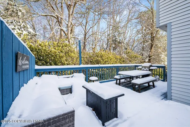 a view of a balcony with chairs
