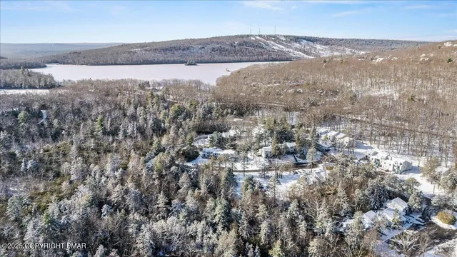 a view of a house with a yard and garage