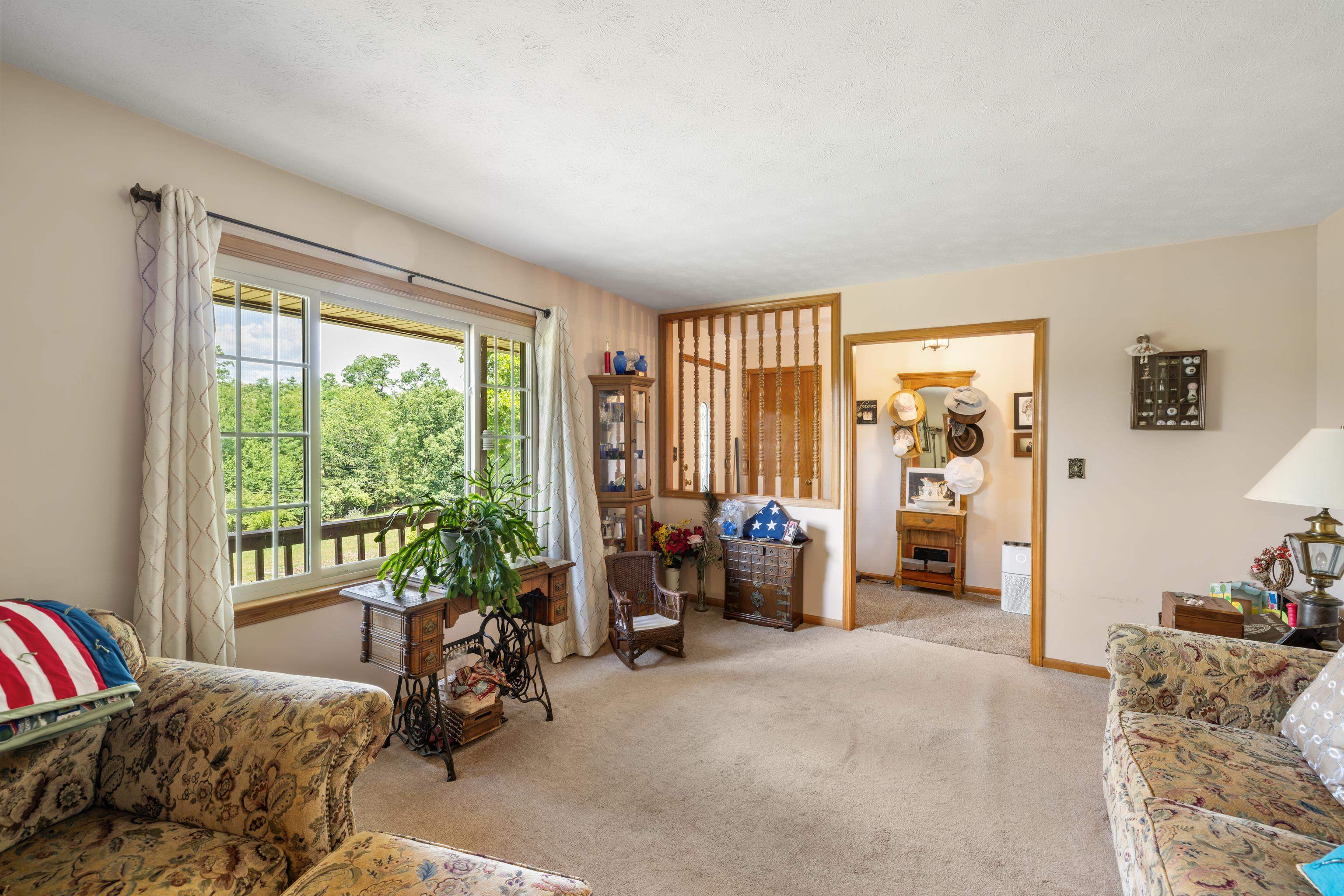 500 Varner Road Churchville, VA 24421 - Photo 24 of 64 a living room with furniture and a large window