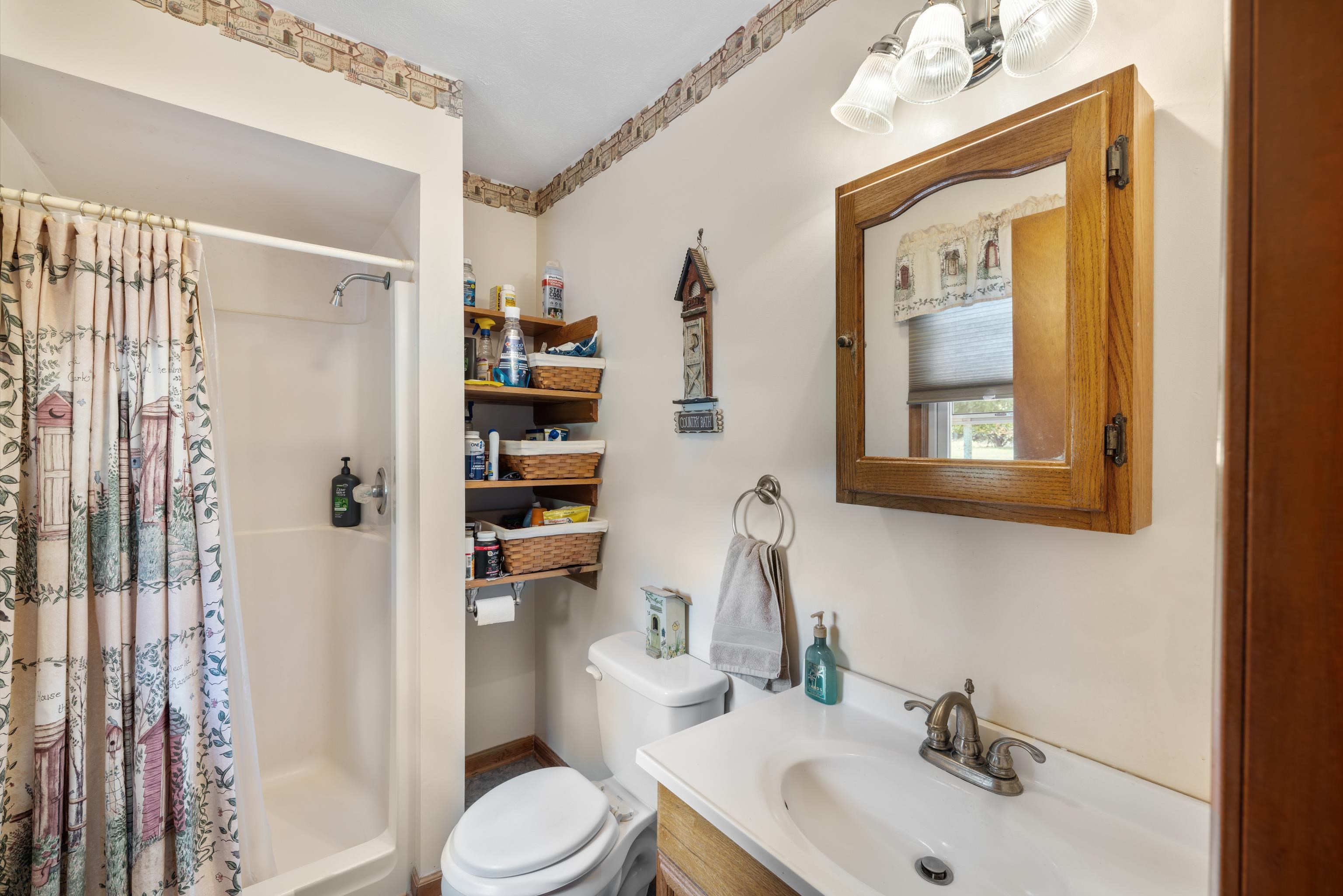 500 Varner Road Churchville, VA 24421 - Photo 32 of 64 a bathroom with a sink toilet and shower