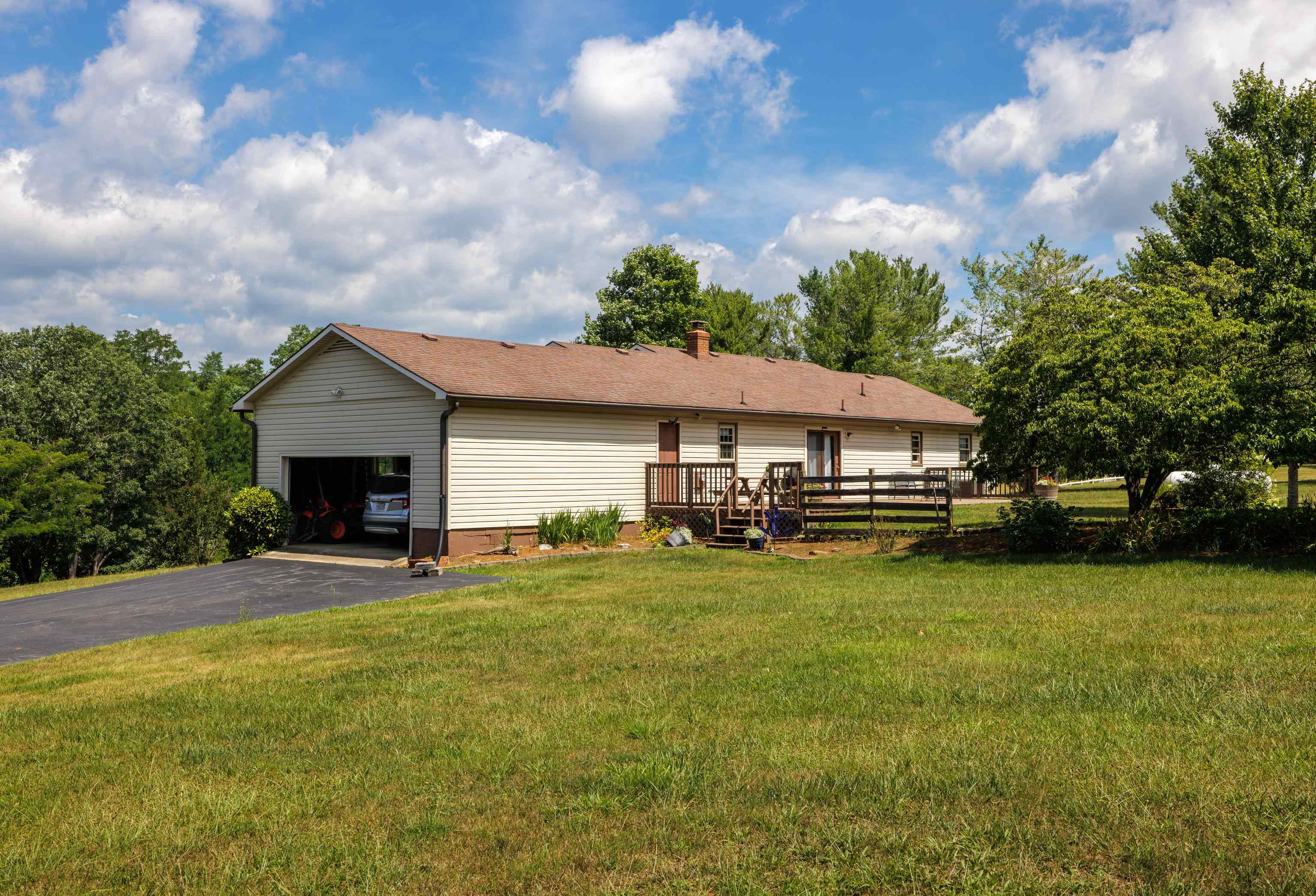 500 Varner Road Churchville, VA 24421 - Photo 50 of 64 a front view of house with yard and trees in the background