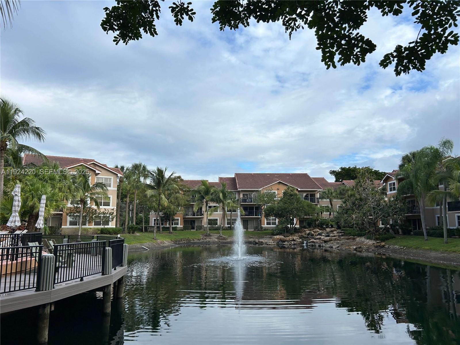 8977 Wiles Road, Unit 208 Coral Springs, FL 33067 - Photo 19 of 28 a view of lake