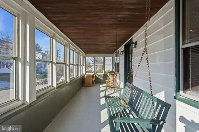 a view of balcony with furniture