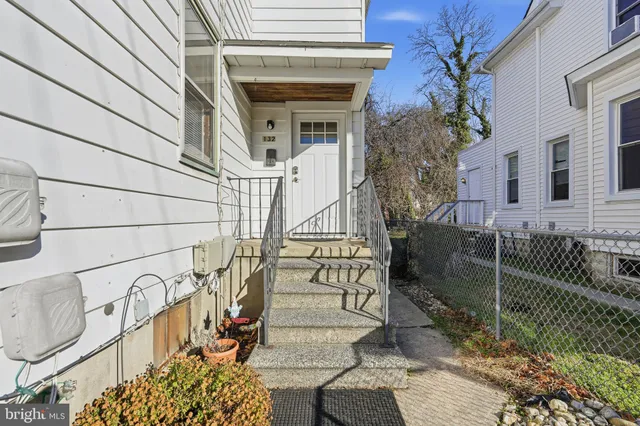 a view of a brick house with a large windows