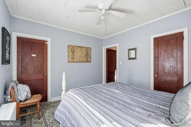 a bedroom with a bed and furniture