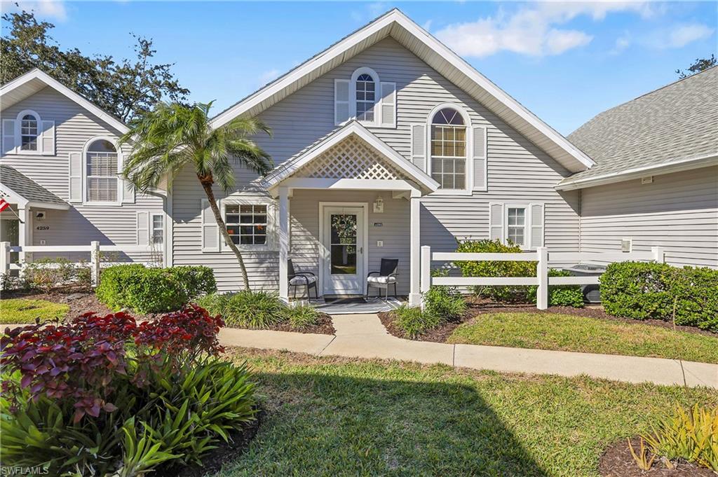 4261 Ute Court Estero, FL 33928 - Photo 2 of 44 Front of house featuring covered entry