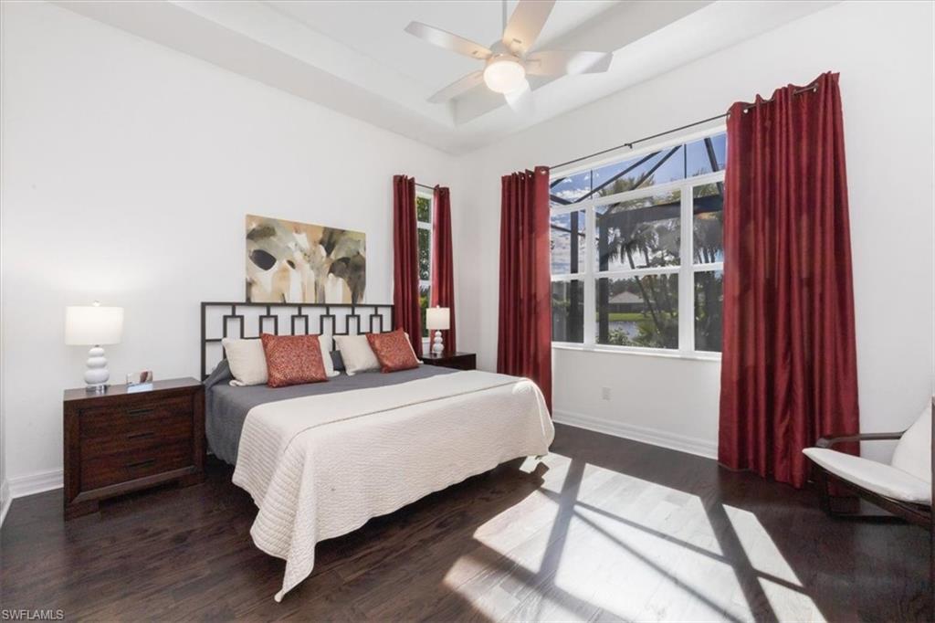 2981 Willow Ridge Court Fort Myers, FL 33905 - Photo 18 of 39 a bedroom with a large bed and a window