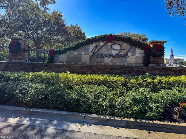 a view of a street with flower garden