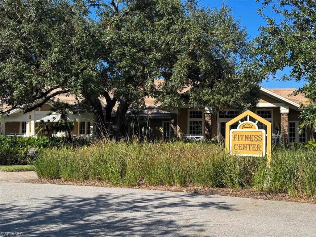 2981 Willow Ridge Court Fort Myers, FL 33905 - Photo 28 of 39 a front view of a house with a yard