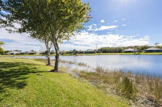 a view of a lake with a big yard