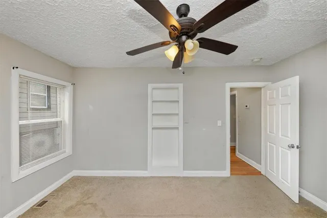 a view of a room that has a window