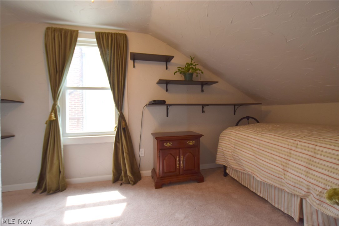 136 Sunset Road Avon Lake, OH 44012 - Photo 19 of 25 Bedroom #3 (upstairs) has walk-in closet with attic access for additional storage space.