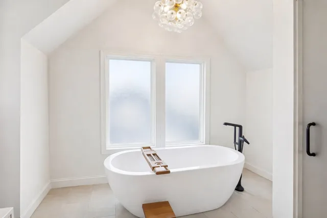 a view of a chairs and table on the wooden floor