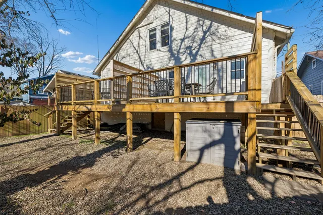 a kitchen with a refrigerator and a sink