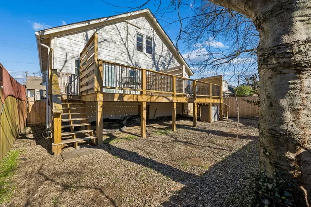 a kitchen with stainless steel appliances a stove a sink and a counter space