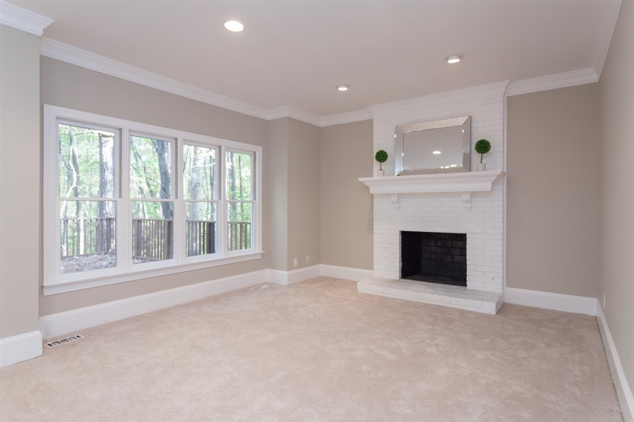 5516 North Hawthorne Park Raleigh, NC 27613 - Photo 5 of 25 Gorgeous family room off the nook area with wood burning fireplace Family Room