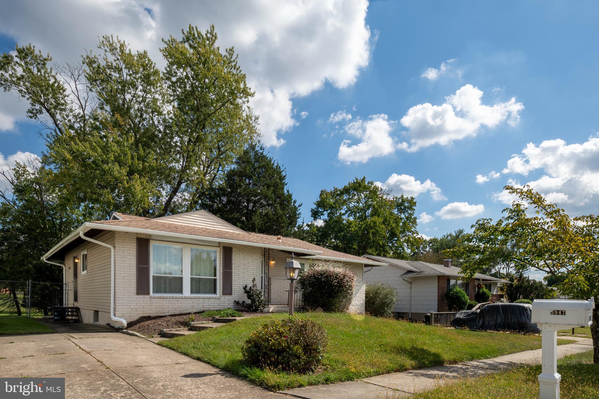 3947 Setonhurst Road Baltimore, MD 21208 - Photo 2 of 30 a front view of a house with garden