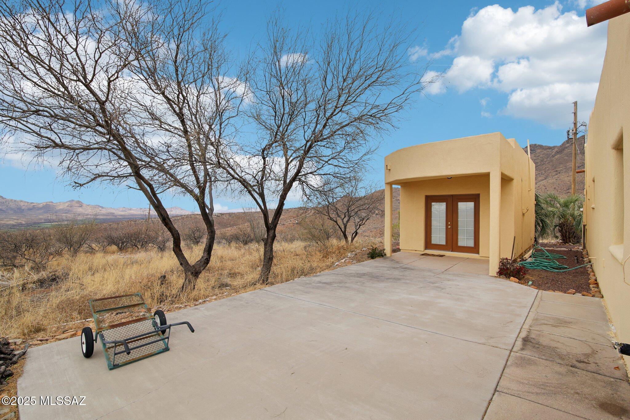 351 Camino Canoa Rio Rico, AZ 85648 - Photo 32 of 34 a view of backyard with hardwood