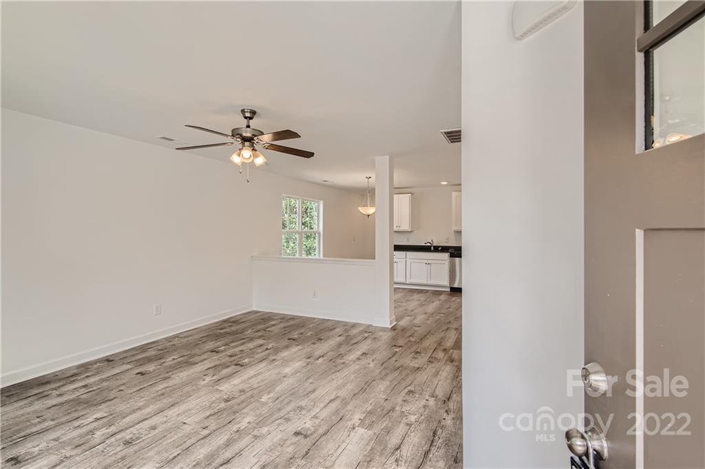 1704 Mooresville Road Salisbury, NC 28147 - Photo 2 of 9 a view of an empty room with a window