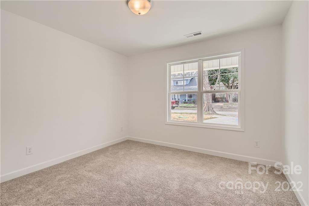 1704 Mooresville Road Salisbury, NC 28147 - Photo 8 of 9 an empty room with a window