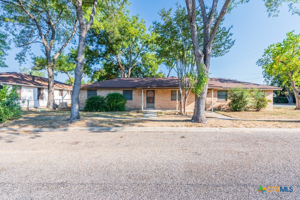 front view of a house with a street