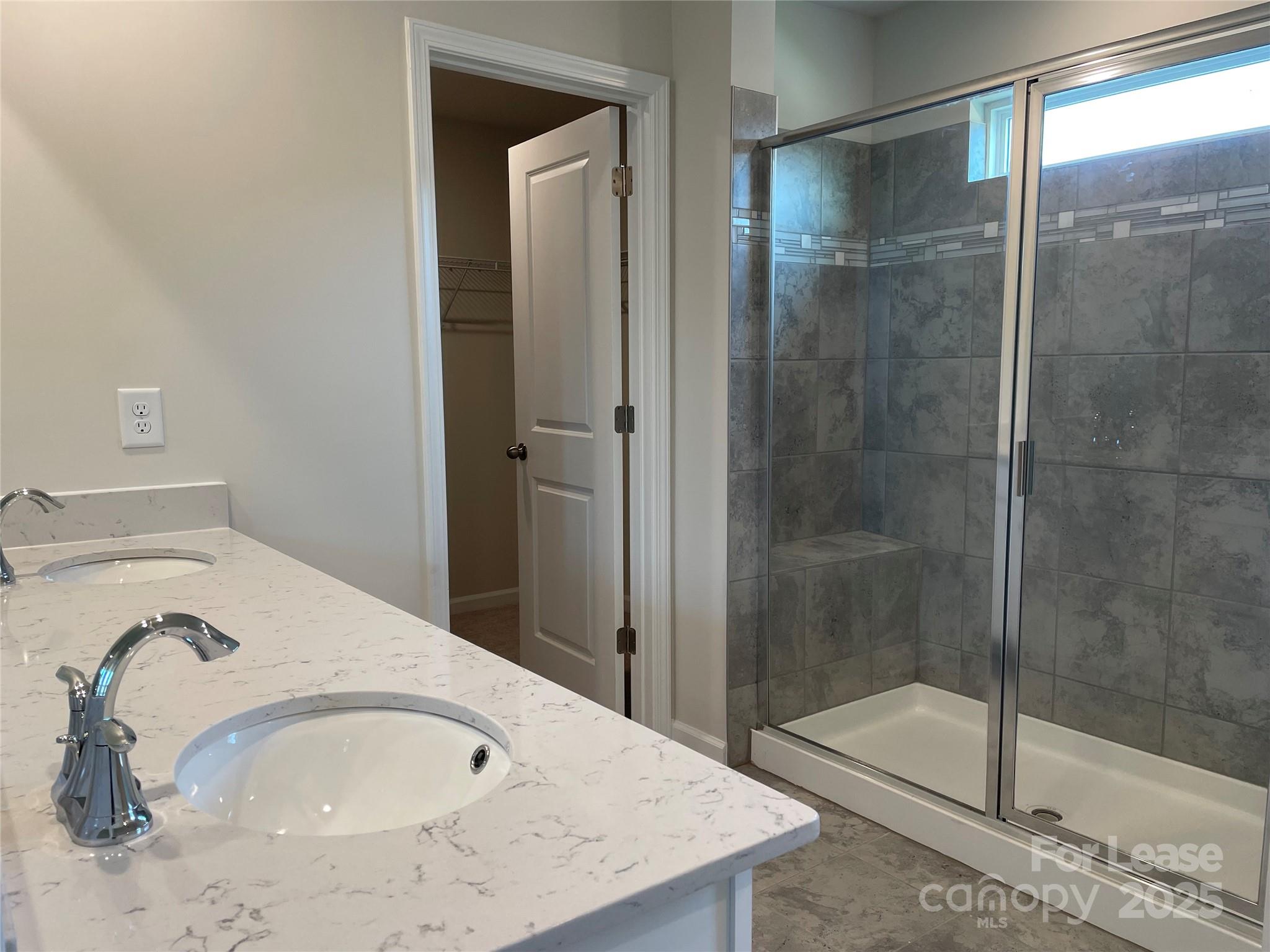 17618 Snug Harbor Road, Unit LOT75 Charlotte, NC 28278 - Photo 16 of 33 a bathroom with a sink and a mirror