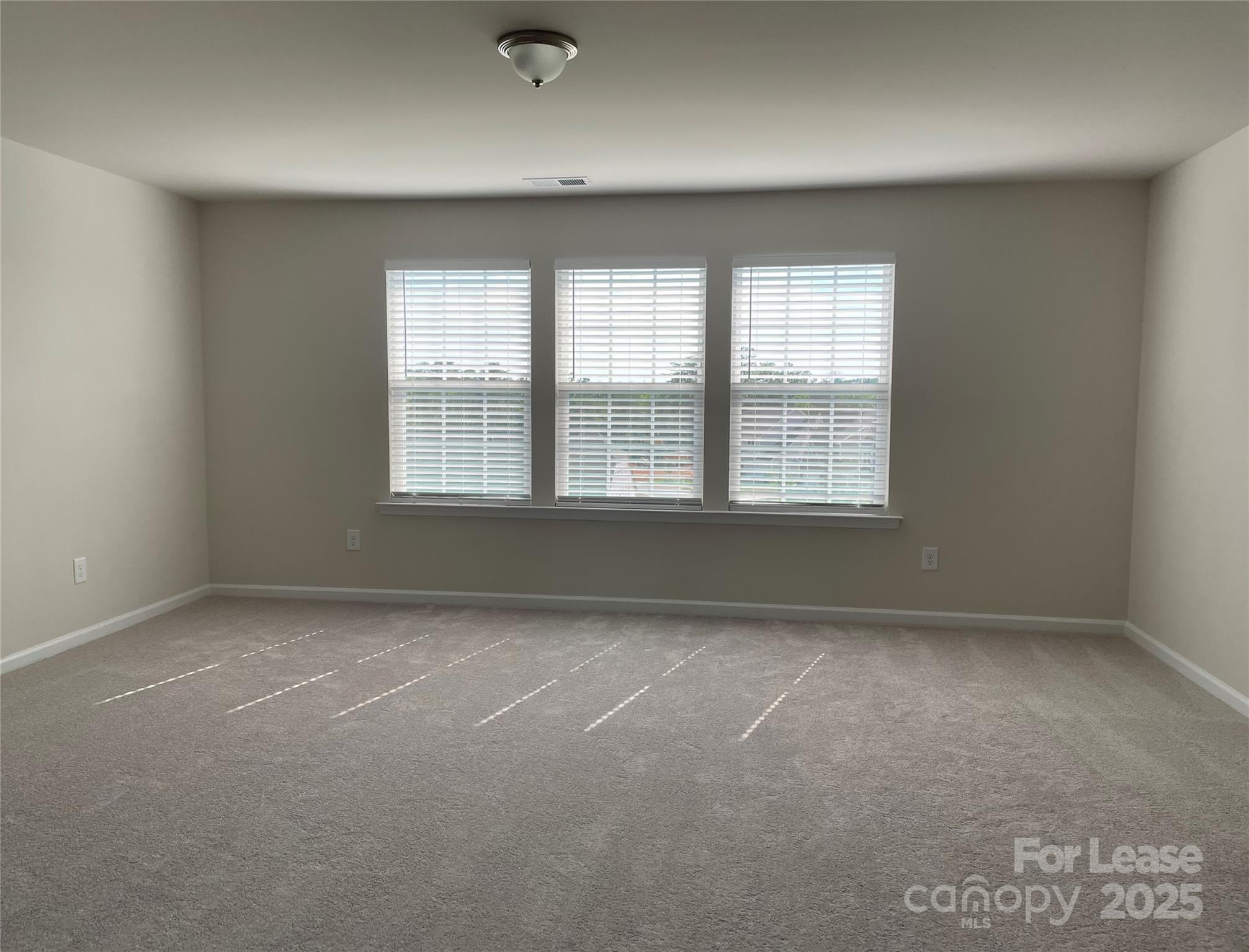 17618 Snug Harbor Road, Unit LOT75 Charlotte, NC 28278 - Photo 18 of 33 an empty room with a window