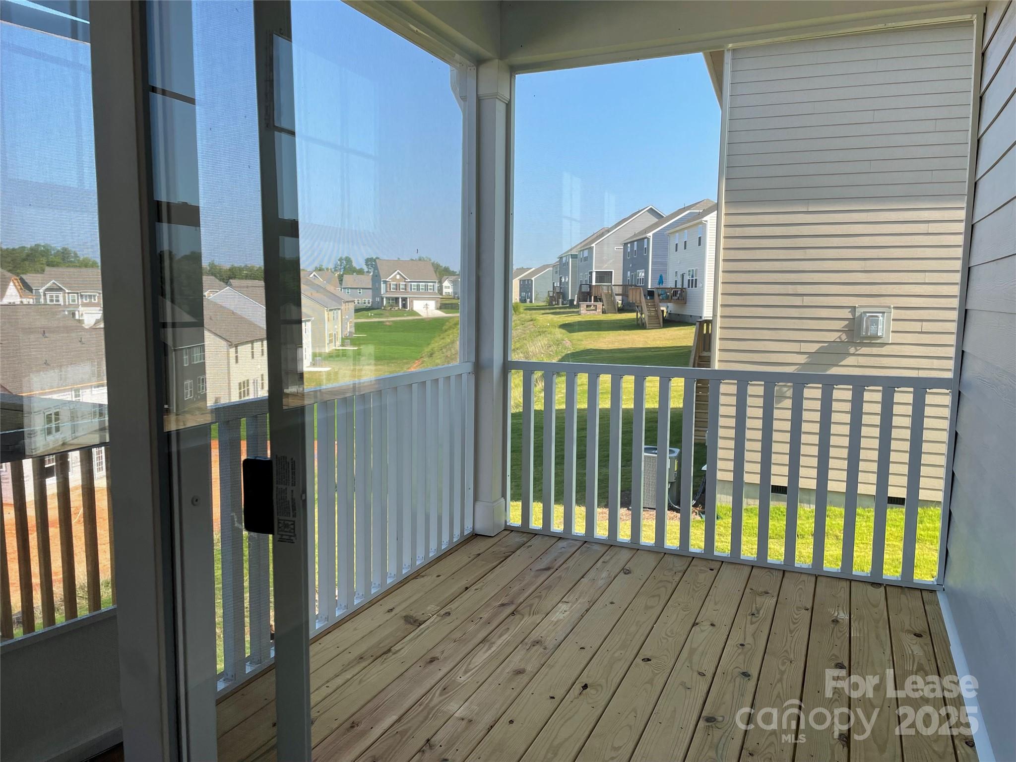 17618 Snug Harbor Road, Unit LOT75 Charlotte, NC 28278 - Photo 24 of 33 a view of wooden balcony