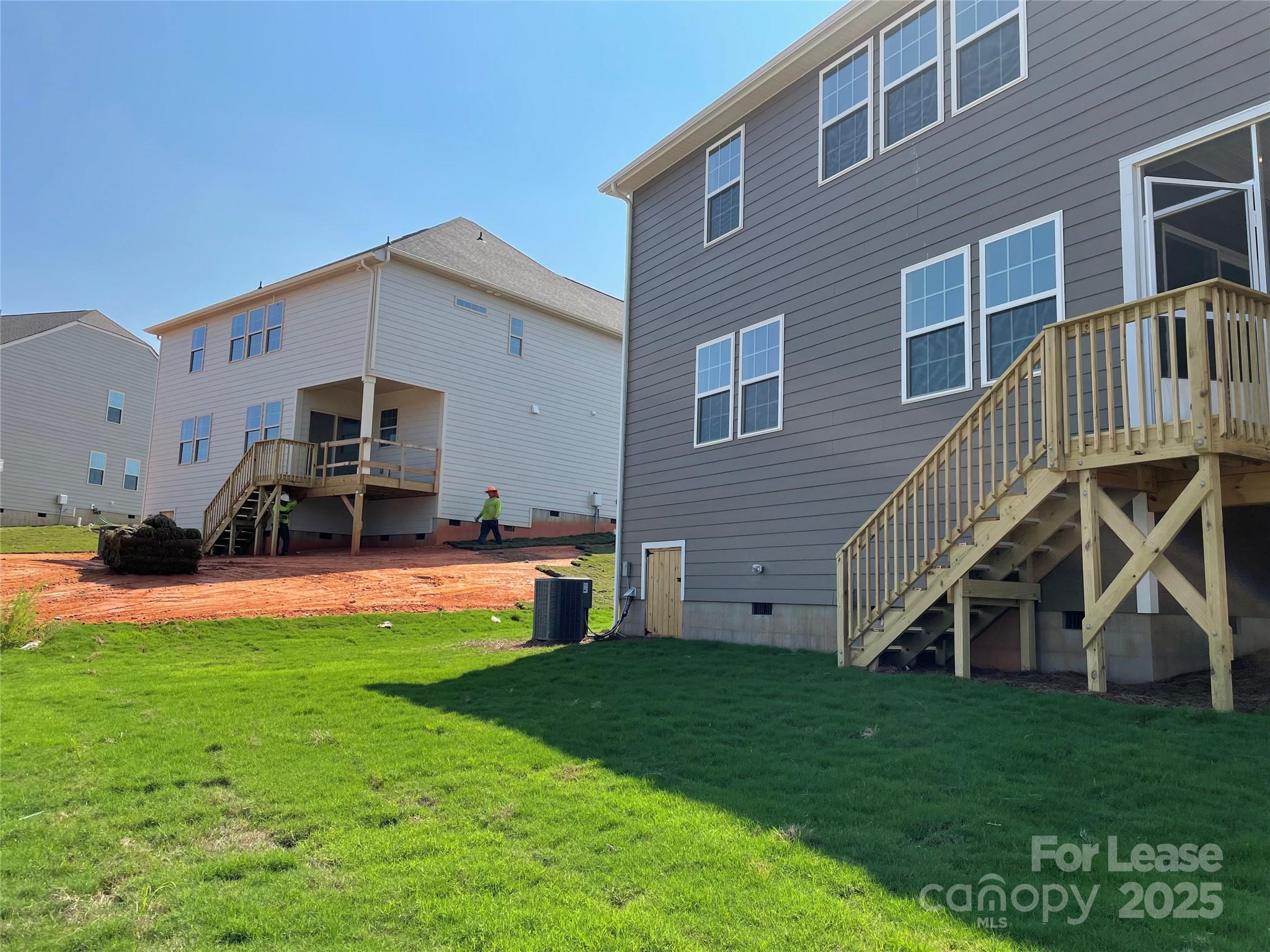 17618 Snug Harbor Road, Unit LOT75 Charlotte, NC 28278 - Photo 25 of 33 a view of a house with a backyard