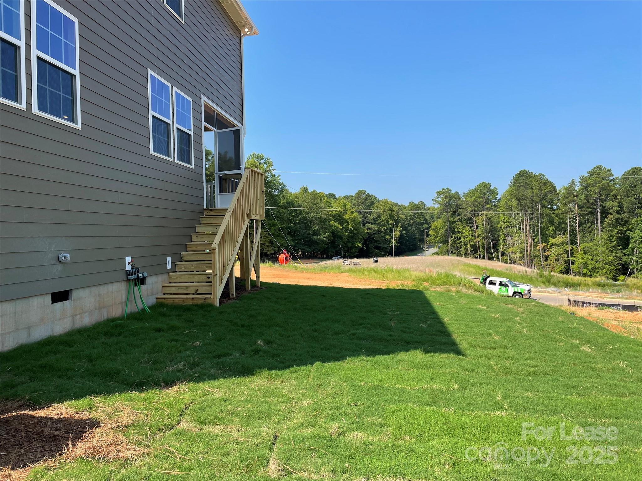 17618 Snug Harbor Road, Unit LOT75 Charlotte, NC 28278 - Photo 27 of 33 a view of a swimming pool with a backyard