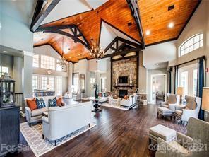 17618 Snug Harbor Road, Unit LOT75 Charlotte, NC 28278 - Photo 30 of 33 a living room with furniture