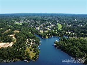 17618 Snug Harbor Road, Unit LOT75 Charlotte, NC 28278 - Photo 33 of 33 an aerial view of a residential houses with outdoor space and trees