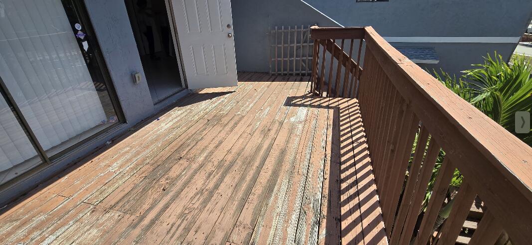 1 Crossings Circle, Unit F Boynton Beach, FL 33435 - Photo 2 of 11 a view of balcony and wooden floor