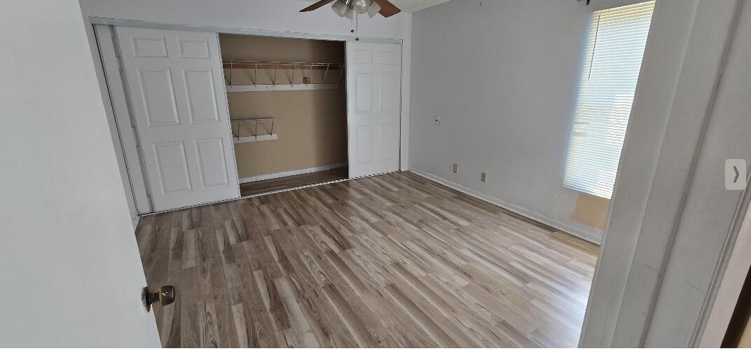 1 Crossings Circle, Unit F Boynton Beach, FL 33435 - Photo 6 of 11 a view of an empty room with a window