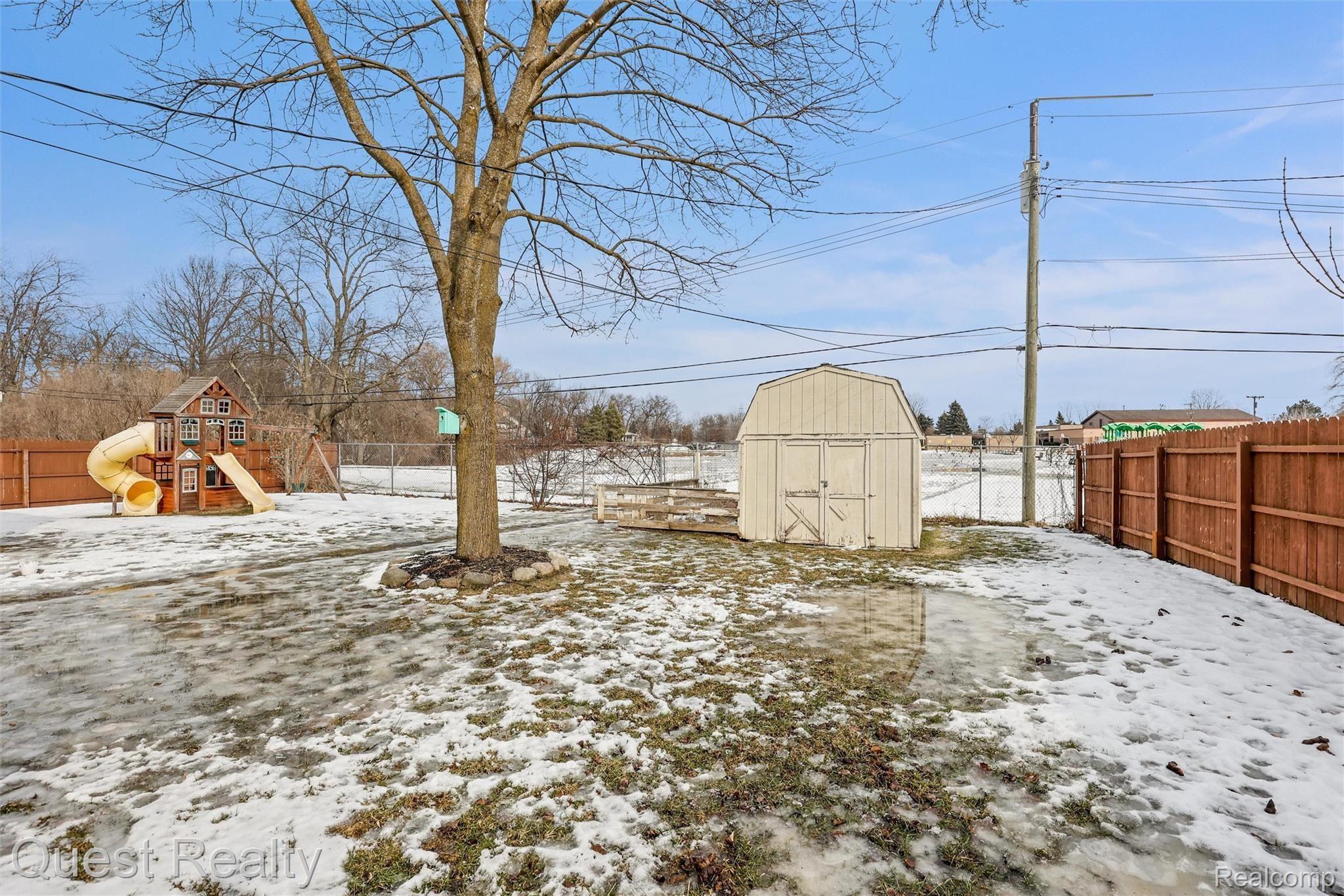 3539 Minton Road Lake Orion, MI 48359 - Photo 5 of 29 large fenced yard with shed- backs up to Carpenter Elementary