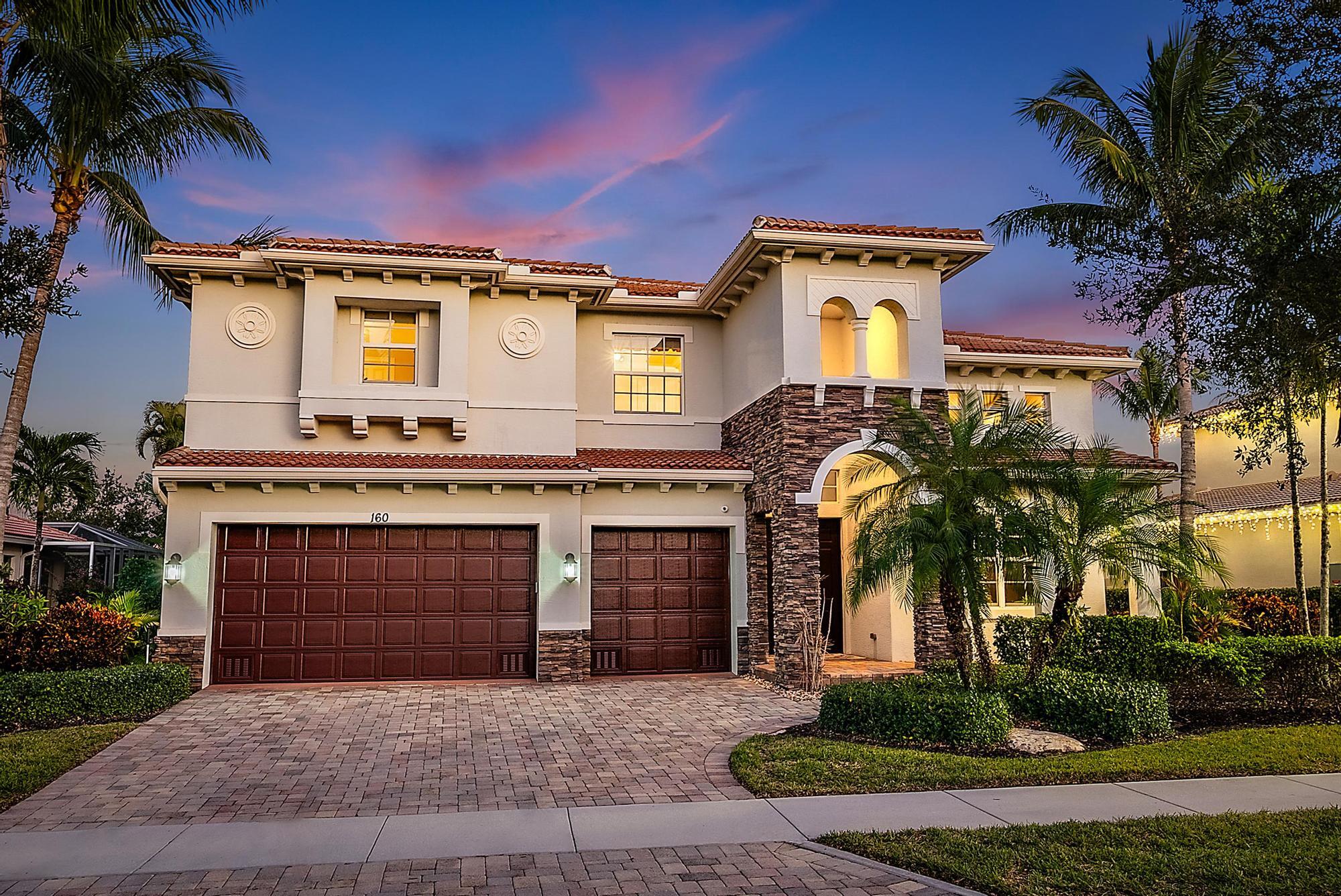 160 Umbrella Place Jupiter, FL 33458 - Photo 8 of 24 front view of a house